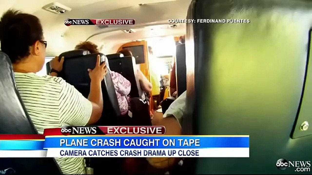 Airplane crash and people falling out...caught on tape