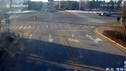 Electro-tricycle has nasty crash with SUV at crossroads