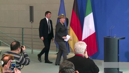 Merkel, Renzi pledge to tackle migrant influx