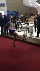 Girl doing tricks on football