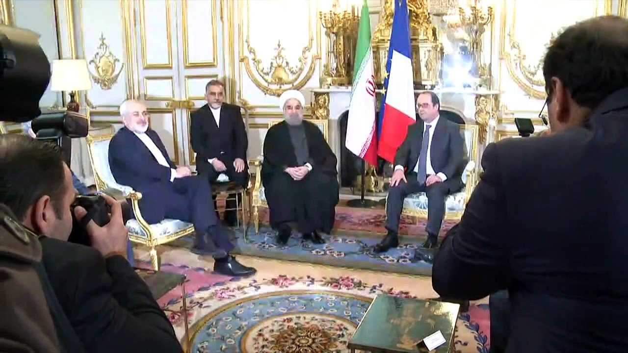 Hollande to Rouhani: France is "committed to human rights".