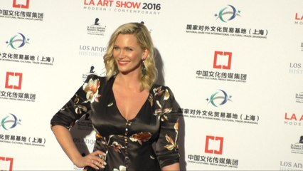 Anne Hathaway Shows Baby Bump At LA Art Show 2016