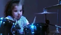 5 year old girl slaying the drums