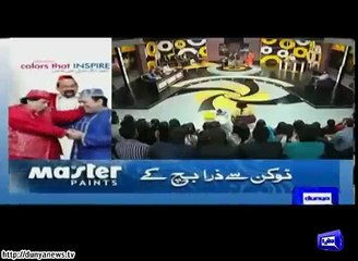 Jogi baba and saeed ajmal playing with each other.