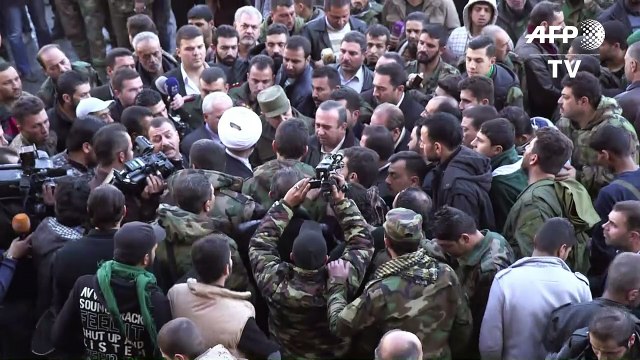 IS-claimed bombings kill dozens near Syria Shiite shrine