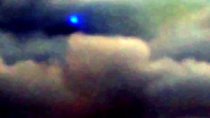 UFO FLYING BEHIND THE PLANE!