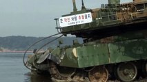 Republic of Korea Black Panther tank are crossing a river depth of 4.1 meters using  snorkel system