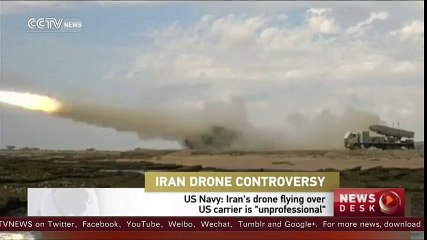 Iranian drone flew over US carrier in -unprofessional- move