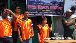 Muna Thapa Magar contributing to earthquake victims some relief materials  at Ghairug, Gorkha