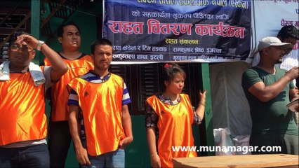Muna Thapa Magar contributing to earthquake victims some relief materials  at Ghairug, Gorkha