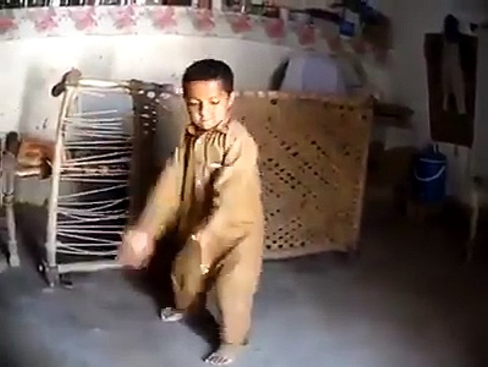 A little boy dancing on PTI song