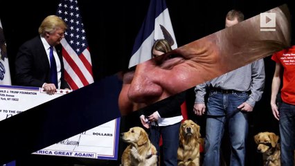 The Latest: Trump gives money to veterans charity