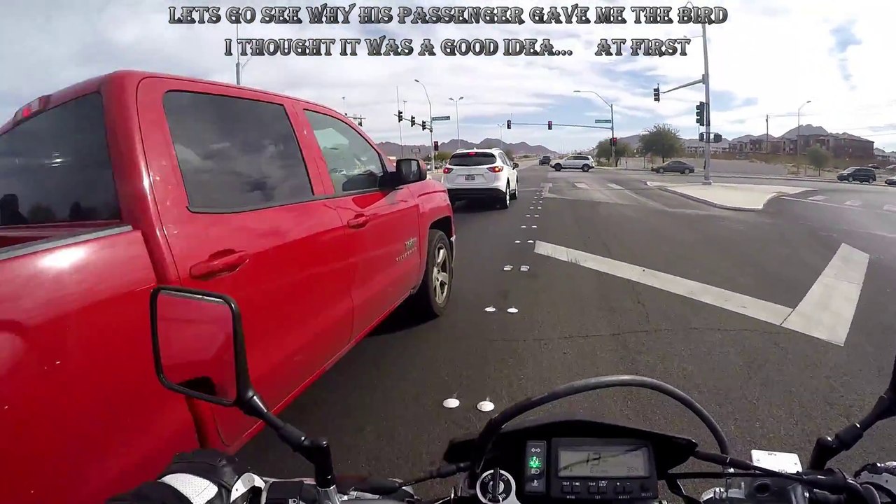 ROAD RAGE - BIKER GETS GUN PUT IN HIS FACE