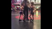 Boy fells his twin brother with a single surprise punch after losing a wrestling match to him