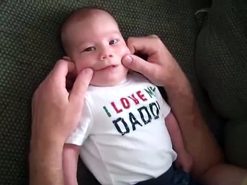 Funny baby sticking tongue out