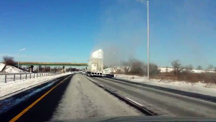 Snow Clears Off Truck Roof