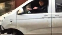 Moment minibus loses a wheel but man carries on driving