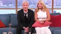 Holly Willoughby and Phillip Schofield present 'This Morning' in their stained NTA outfits after a raucous night out