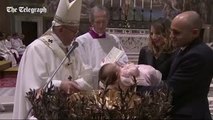 Pope Francis baptises 26 newborns in the Sistine Chapel