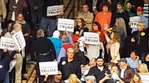 Muslim woman ejected from Donald Trump rally after silent protest over refugee comments