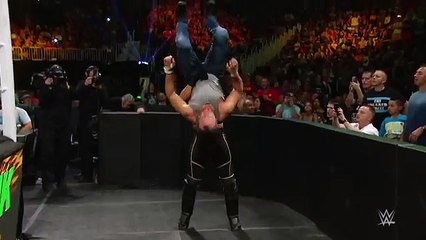 Seth Rollins powerbombs Dean Ambrose into the barricade- Slow Mo Replay from Money in the Bank 2015