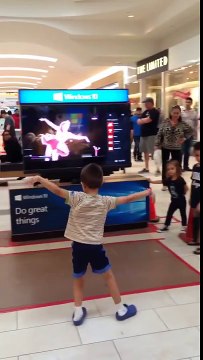 Little Boy Dances at the Mall