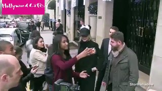 Gigi Hadid stops for selfies with fans wearing silly hat