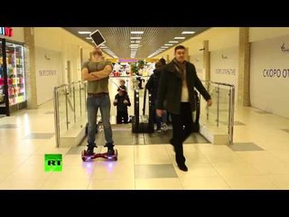 Hockey Stick vs iPad: Boy knocks off balancing gadget from man on Hoverboard