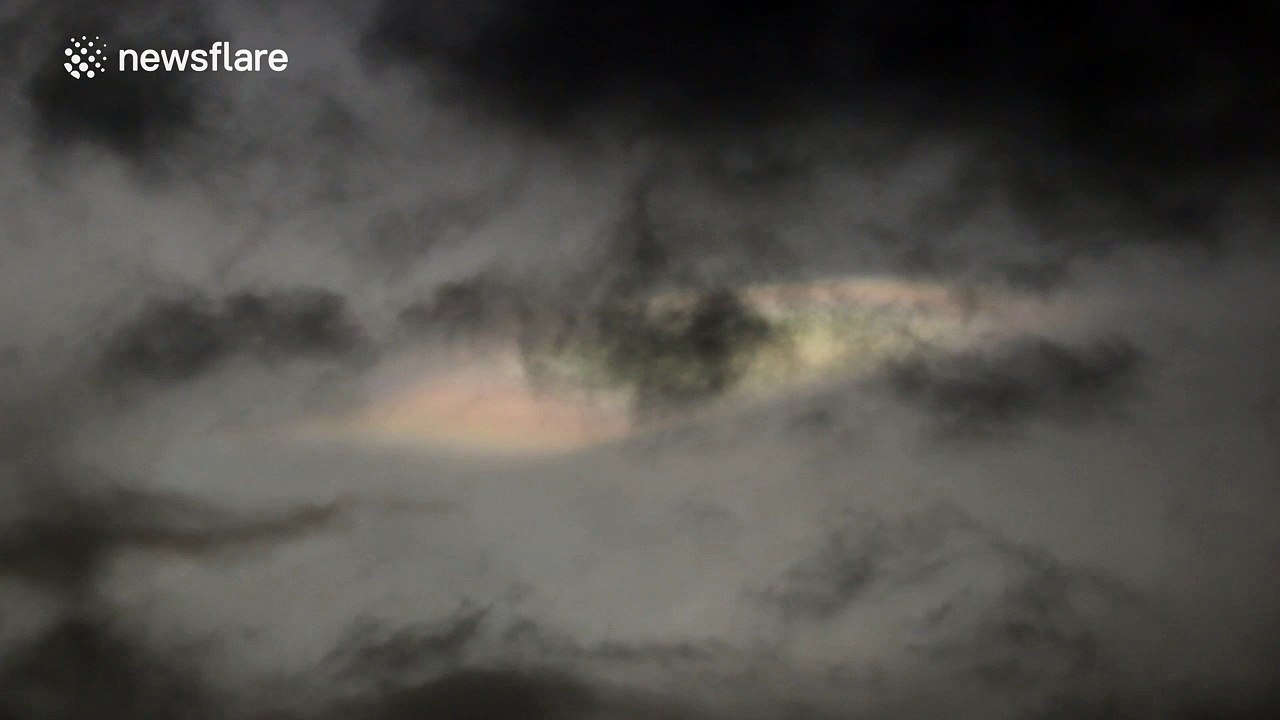 Rare colourful nacreous clouds filmed through 400mm lens