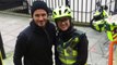 David Beckham helps a cycling paramedic and elderly patient