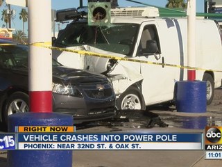 Vehicle crashes into light pole in Phoenix