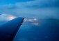 Plane Flies Past Rapid-Speed Lightening Storm