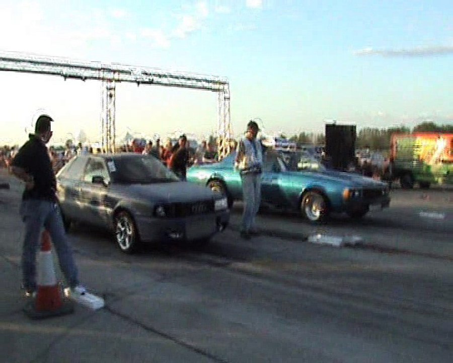 Audi 90 Quattro Turbo Vs. Chevy Caprice Coupe 8.2 V8 Drag Race