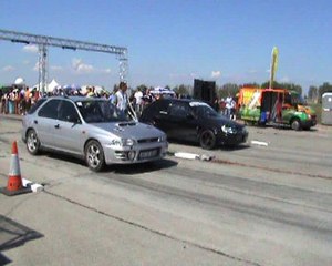 Ford Fiesta RS Turbo Vs. Subaru Impreza Drag Race