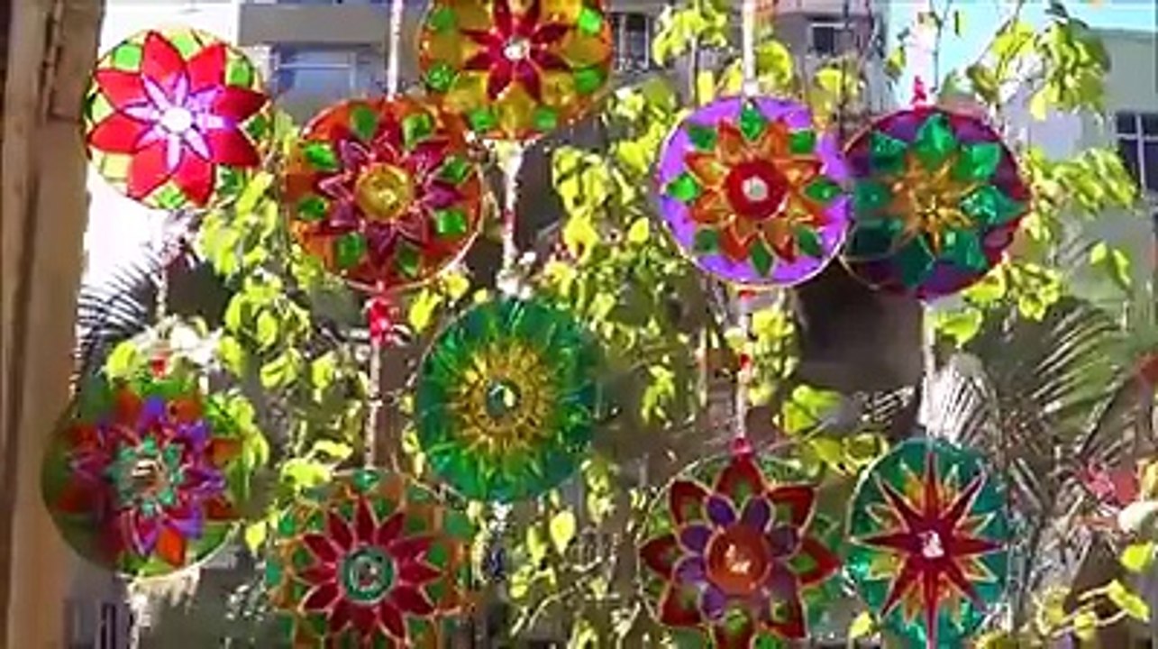 see this man making a nice thing by cds