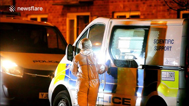 Police outside home where woman and two children were found dead in Leeds