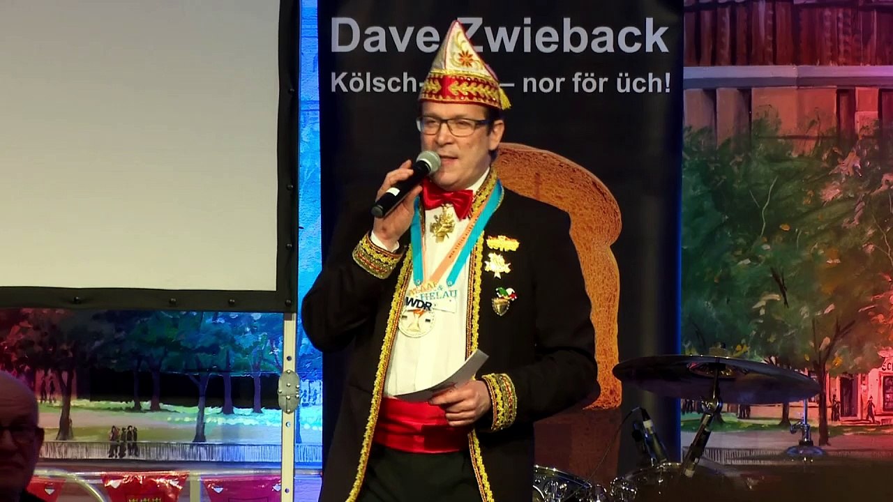 Merkel knackt harte Nüsse beim Kölner Karneval