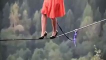 a girl is walking on a rope it is amazing scene-Top Funny Videos-Top Funny Prank