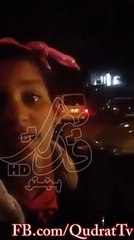 Girl saleswoman roses in the streets of Morocco sing a song