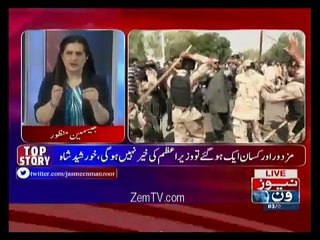 Jasmeen Manzoor plays a video of Ranger's person with a pistol in his hand during protest