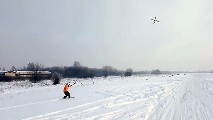 DroneBoarding: Snowboarding towed by a drone
