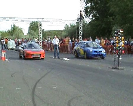 Nissan 200 SX Turbo Vs. Subaru Impreza WRX STI Drag Race