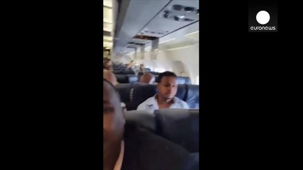 Mid-air explosion blasts hole in Somalian plane while flying!!