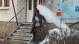 Falling Ice ALMOST Hits Lady