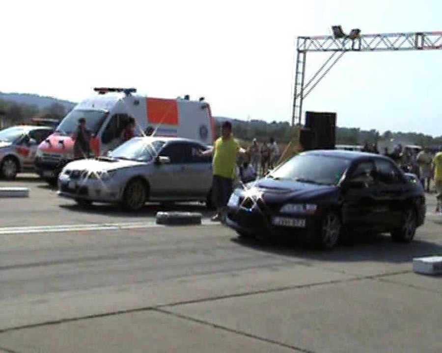 Subaru Impreza WRX STI Vs. Mitsubishi Lancer EVO VIII Drag Race