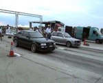 Audi S2 Coupe Vs. BMW 325 IX Turbo Drag Race