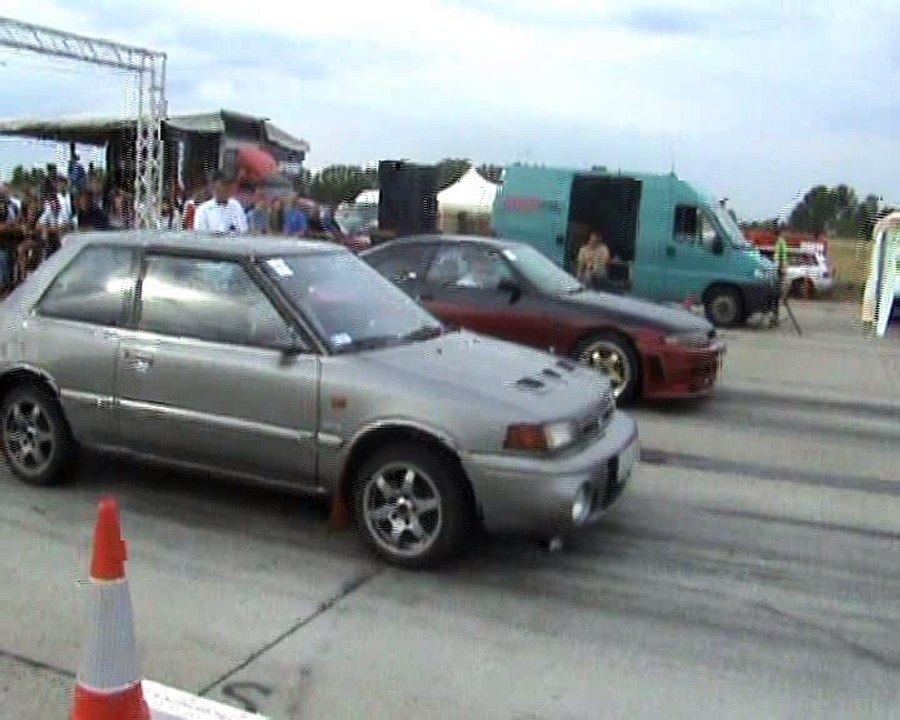 Nissan Skyline GTS Vs. Mazda 323 Turbo 4X4 Drag Race