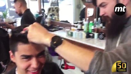 Luis García visitó la Peoples Barber and Shop