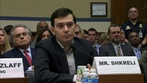 Martin Shkreli smirks as he refuses to answer questions