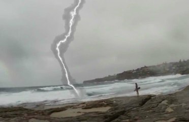 Girl On The Beach Almost Struck By Lightning